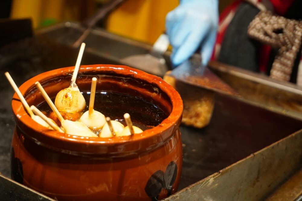 Traditional sweets and fresh fruit at Kuromon Ichiba Market