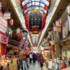 Street food stalls at Kuromon Ichiba Market, Osaka